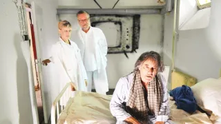 Okno do hřbitova